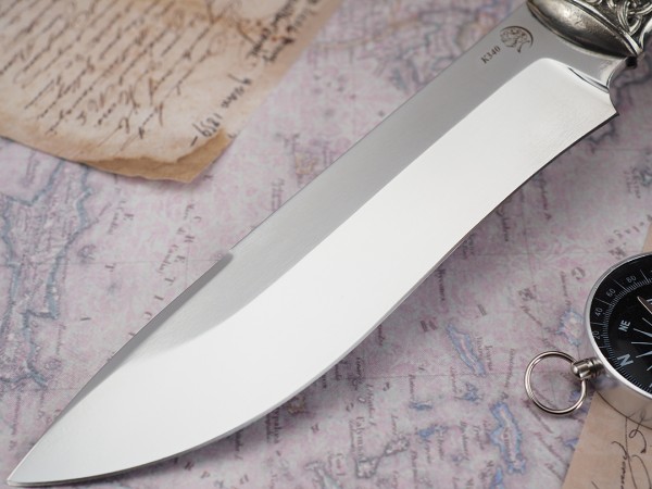 Нож Егерь, клинок из стали Bohler K340, рукоять художественное литье мельхиор, стабилизированная карельская береза, элфорин, скримшоу