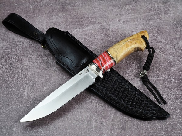 Нож Беркут, клинок из стали Bohler S390, рукоять стабилизированная карельская береза, стабилизированный зуб мамонта, формованные ножны-итальянская кожа растительного дубления
